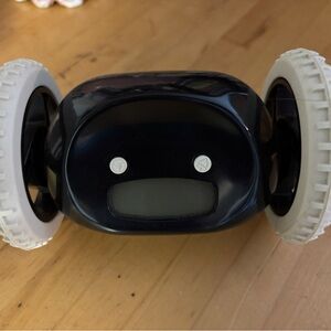 Clocky rolling alarm clock